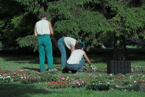Team member carrying out pre-start inspection on hedge trimmers