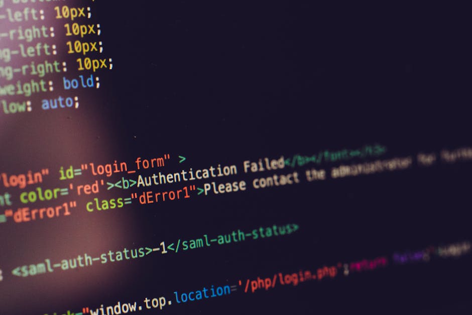 A computer screen displaying a code editor with HTML and CSS code visible on the screen. The code includes tags such as <html>, <head>, <title>, and <link>, with syntax highlighted in various colors i